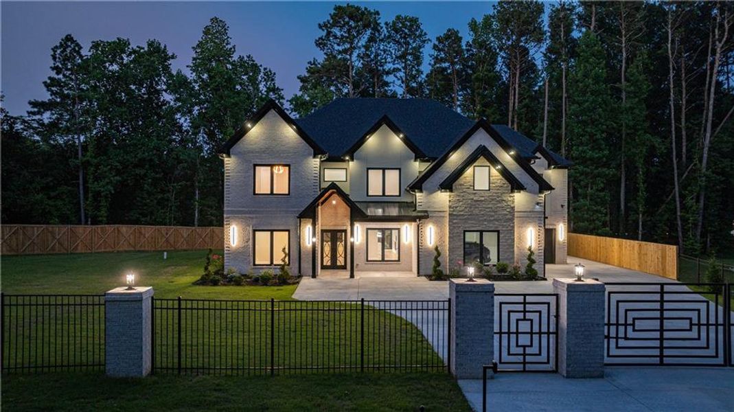 Front exterior of a new home in , Lawrenceville, GA, highlighting curb appeal (Image 26). Front exterior of a new home in , Lawrenceville, GA, highlighting curb appeal (Image 26).