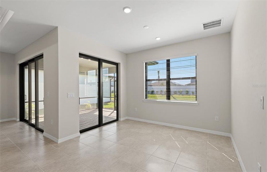 Spacious, unfurnished interior of a new home in The Strand at Cedar Grove, North Port (Image 14).