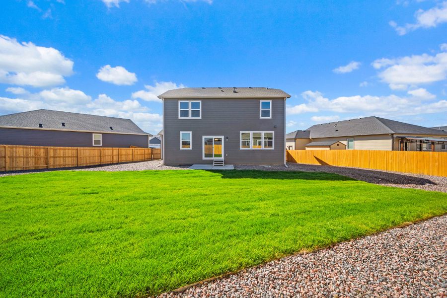Exterior details and patio area of a home in The Glen-12, Colorado Springs (Image 28).
