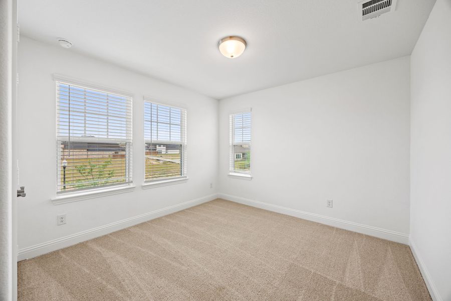 Representative unfurnished interior of a home built from the Kelly by Cambridge Homes in Lake Park, Rowlett (Image 10).