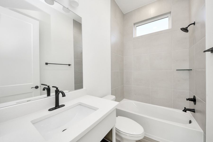 Furnished interior view inside a new home in Meridiana, Manvel (Image 13).