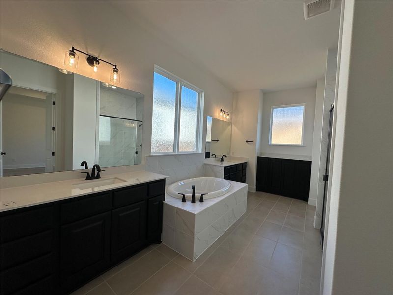 Primary Bath retreat with dual vanities & garden tub