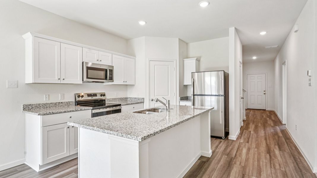 Representative furnished interior of a home built from the Jupiter by Starlight Homes in Castlewood South, Taylor (Image 3). Representative furnished interior of a home built from the Jupiter by Starlight Homes in Castlewood South, Taylor (Image 3).