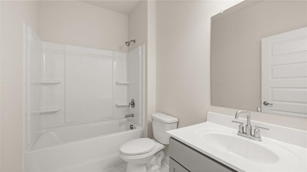 Furnished interior view inside a new home in Oak Ridge Meadows - Active Adult, Locust Grove (Image 15).