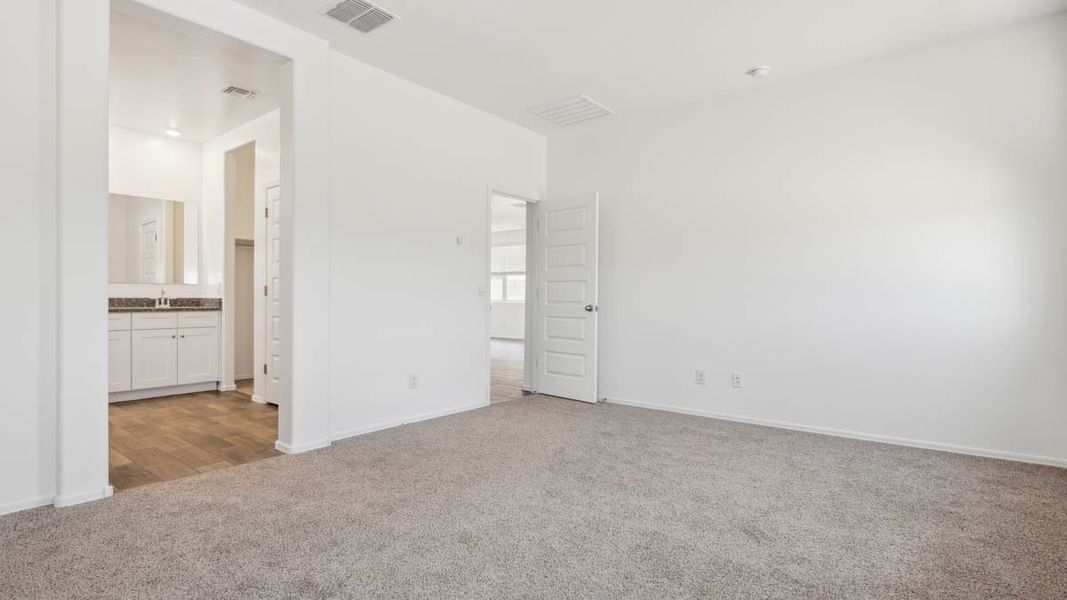 Representative unfurnished interior of a home built from the Puffin by D.R. Horton in Moonlight, Maricopa (Image 16).