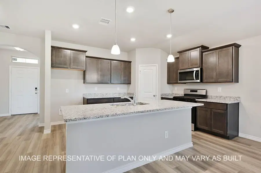 Representative furnished interior of a home built from the Richmond by D.R. Horton in Liberty Village, Brenham (Image 5).