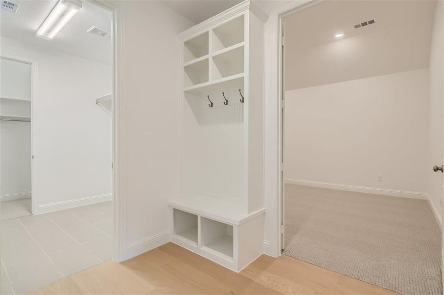 Mudroom featuring light hardwood / wood-style floors