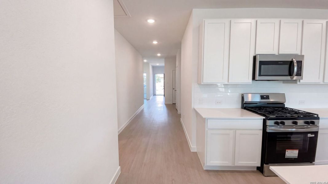 Furnished interior view inside a new home in Waterwheel, San Antonio (Image 10).