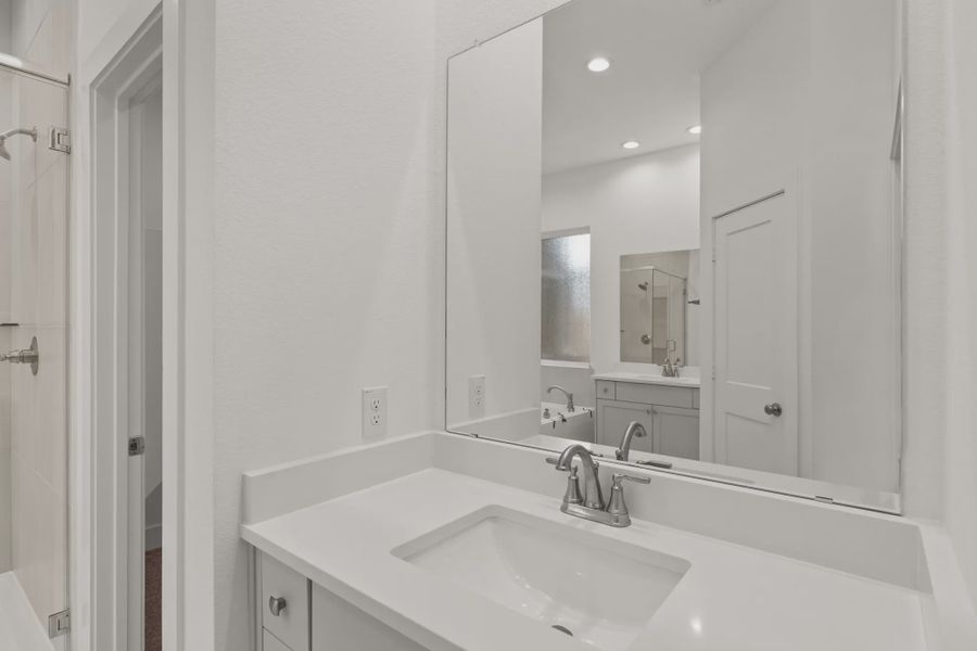 Image 27 representing the Fairway by Chesmar Homes in Riceland Alley Loads, Mont Belvieu, TX.