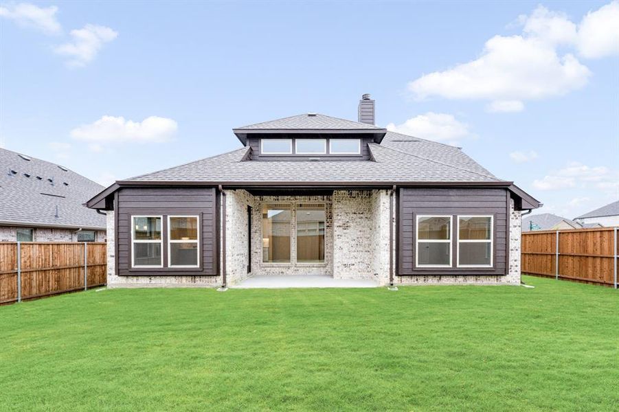 Exterior details and patio area of a home in Woodstone, Providence Village (Image 20). Exterior details and patio area of a home in Woodstone, Providence Village (Image 20).