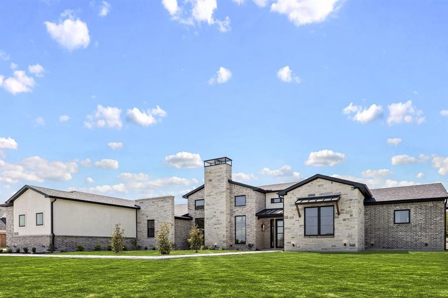 Front exterior of a new home in , Aledo, TX, highlighting curb appeal (Image 23). Front exterior of a new home in , Aledo, TX, highlighting curb appeal (Image 23).