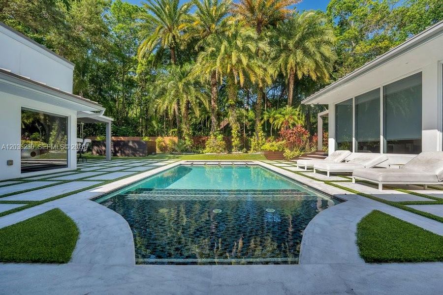 Exterior details and patio area of a home in , Pinecrest (Image 3). Exterior details and patio area of a home in , Pinecrest (Image 3).
