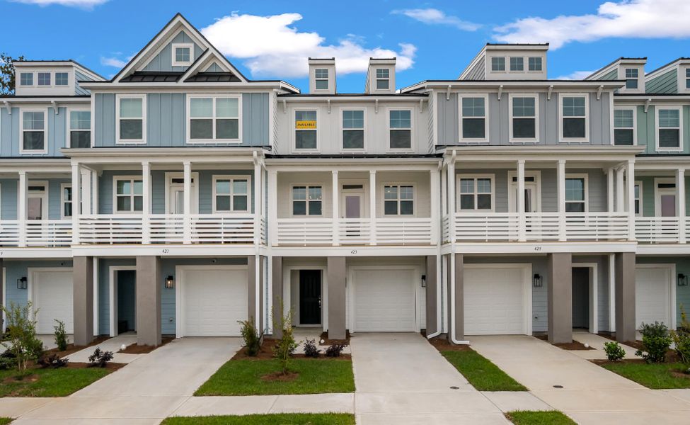 Front exterior of a new home in New Riverside Village, Bluffton, SC, highlighting curb appeal (Image 1). Front exterior of a new home in New Riverside Village, Bluffton, SC, highlighting curb appeal (Image 1).