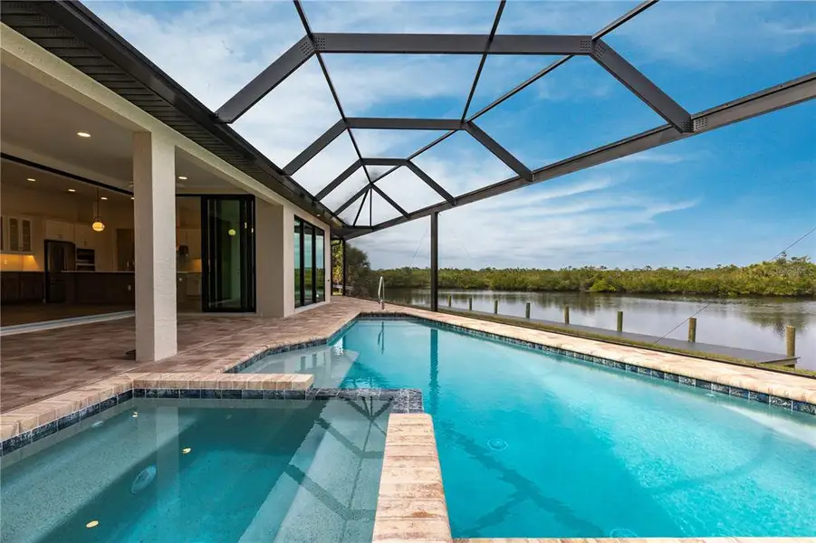 Exterior details and patio area of a home in , Port Charlotte (Image 3).