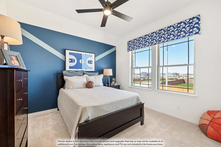 Kids bedroom with blue accent wall, ceiling fan, and two windows with backyard view Kids bedroom with blue accent wall, ceiling fan, and two windows with backyard view