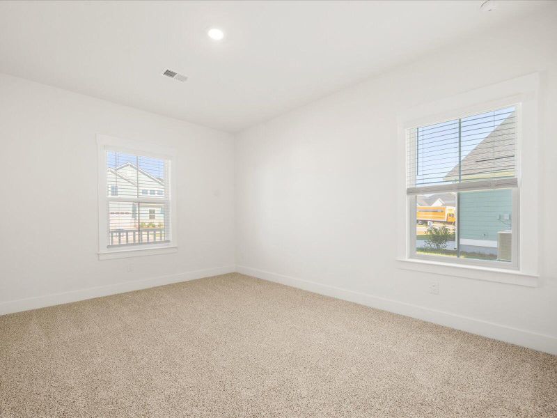 Spacious, unfurnished interior of a new home in The Coves at Lakes of Cane Bay II, Summerville (Image 33). Spacious, unfurnished interior of a new home in The Coves at Lakes of Cane Bay II, Summerville (Image 33).