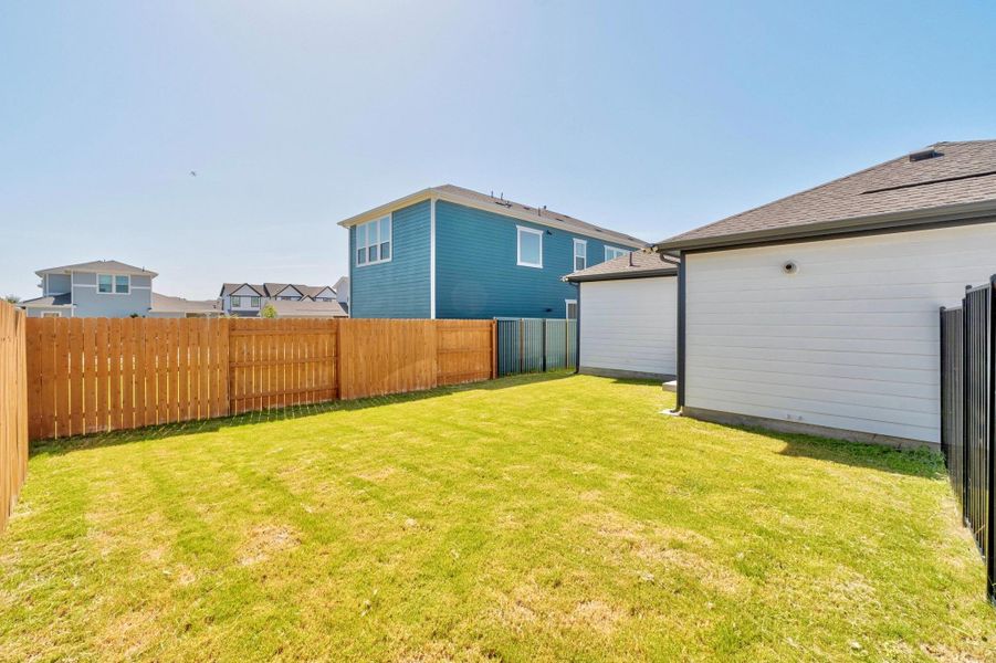 Front exterior of a new home in Easton Park, Austin, TX, highlighting curb appeal (Image 21).