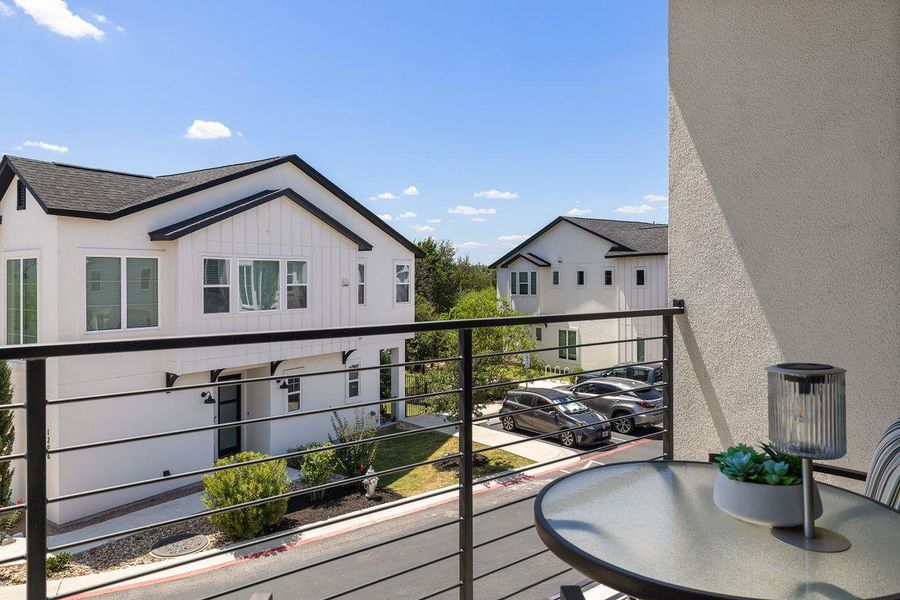 This balcony is off the primary bedroom and is a lovely place for morning coffee. This balcony is off the primary bedroom and is a lovely place for morning coffee.