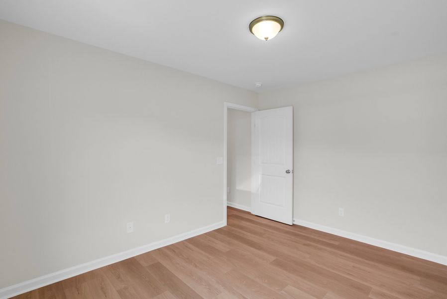 Representative unfurnished interior of a home built from the The Aspen by Smith Family Homes in Sweetwater, Brunswick (Image 26).