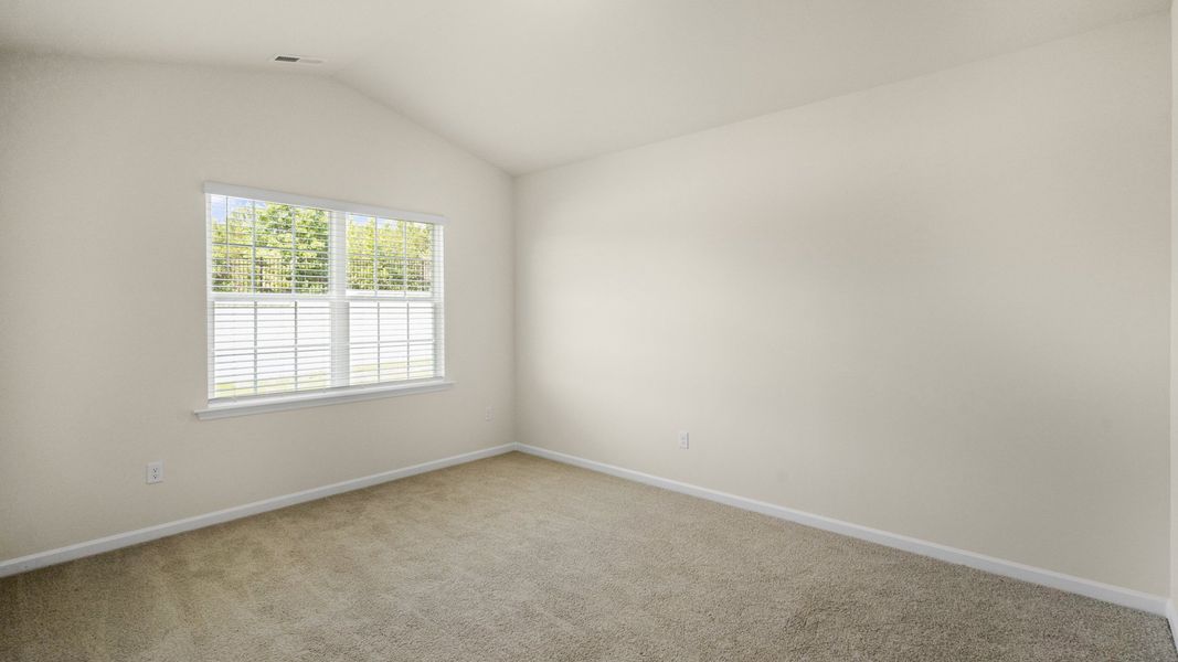 Spacious, unfurnished interior of a new home in The Grove at Matthews Landing, Fuquay Varina (Image 13).
