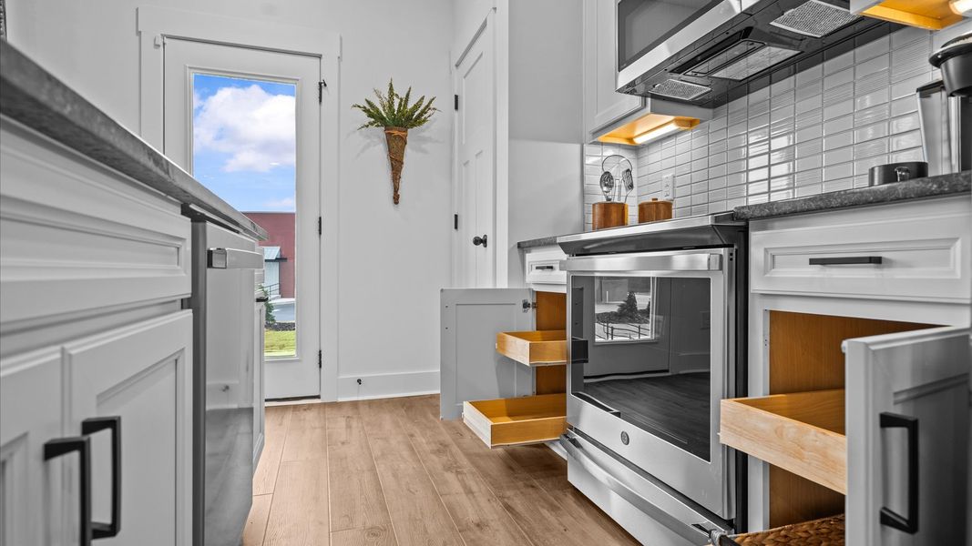 Representative furnished interior of a home built from the Corner Litchfield by DRB Homes in Gresham Station, Simpsonville (Image 14).