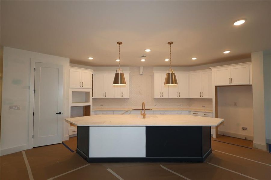 Furnished interior view inside a new home in Maple Grove at Towne Lake, Woodstock (Image 4).