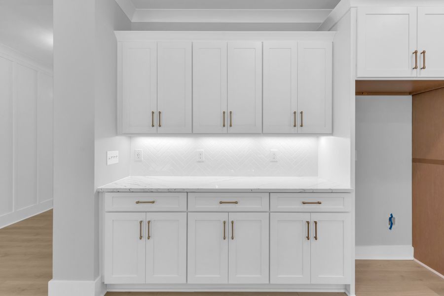 Representative furnished interior of a home built from the The Hampton by RobuckHomes in Stonehenge, Raleigh (Image 11).