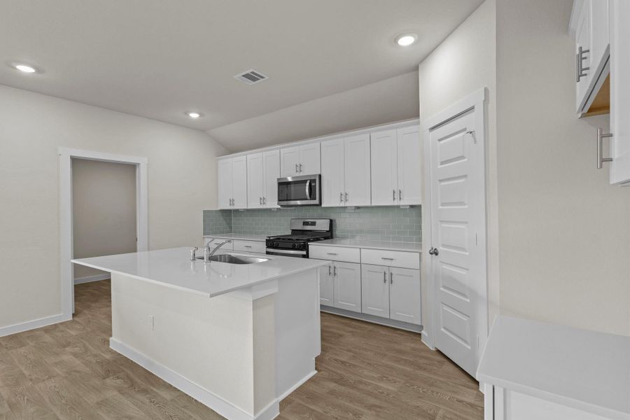Furnished interior view inside a new home in Hartland Ranch, Lockhart (Image 8).