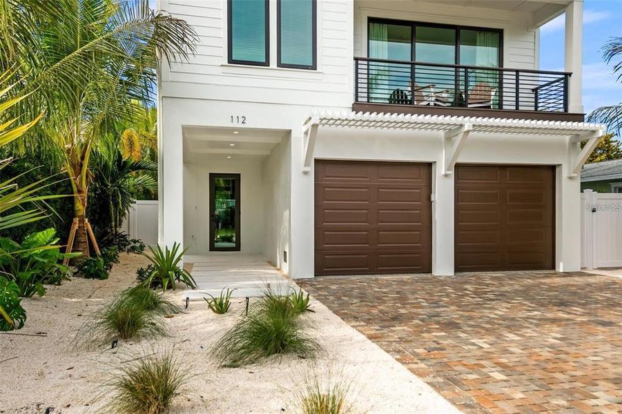 Front exterior of a new home in , Anna Maria, FL, highlighting curb appeal (Image 21).