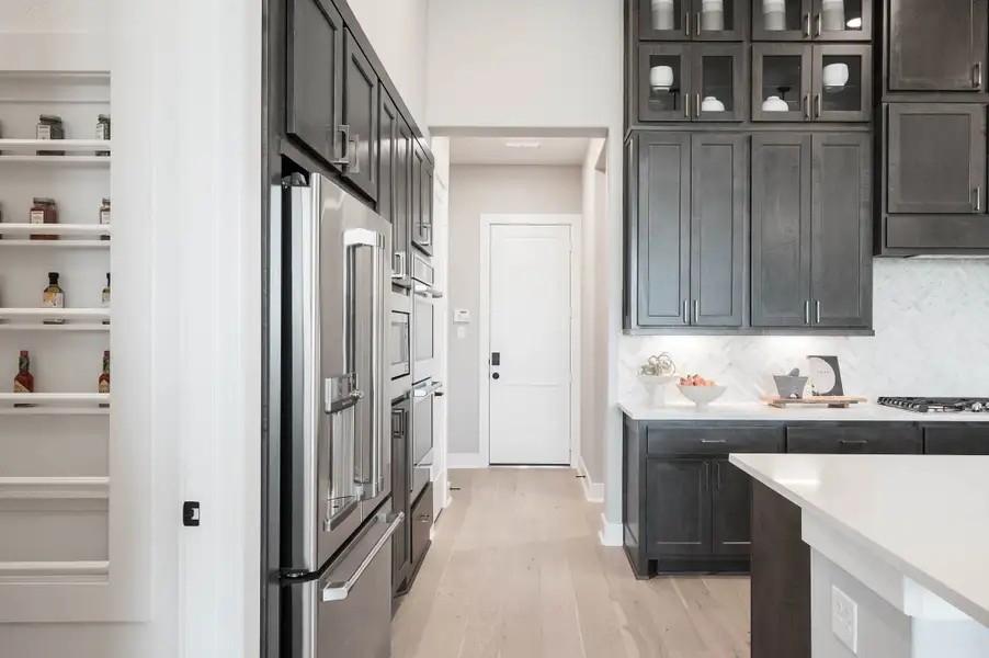Furnished interior view inside a new home in The Orchard At Pecan Ridge, Fulshear (Image 10).
