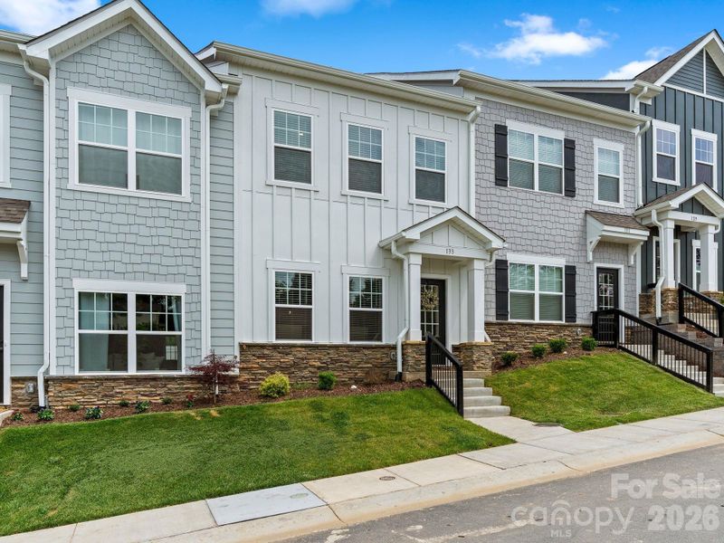 Front exterior of a new home in , Asheville, NC, highlighting curb appeal (Image 27).