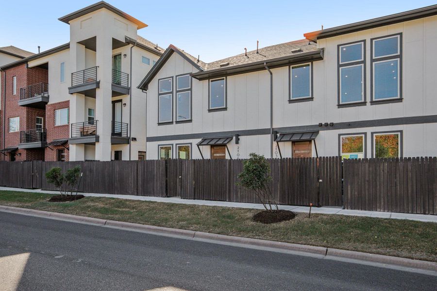 Exterior details and patio area of a home in Koenig Townhomes, Austin (Image 23).
