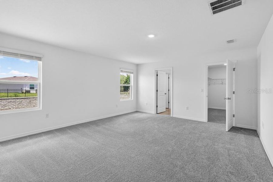 Spacious, unfurnished interior of a new home in Waterstone, Groveland (Image 41).