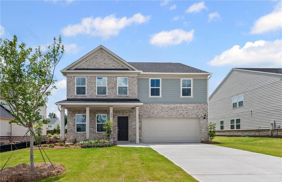 Front exterior of a new home in Hawthorne Ridge, McDonough, GA, highlighting curb appeal (Image 2).