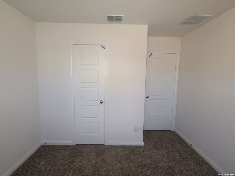 Spacious, unfurnished interior of a new home in Hunters Ranch, San Antonio (Image 30).