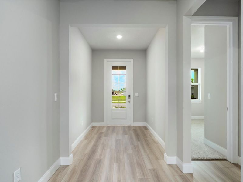 Entry in the Coral floorplan at 6295 NW Sweetwood Drive in Brystol at Wylder