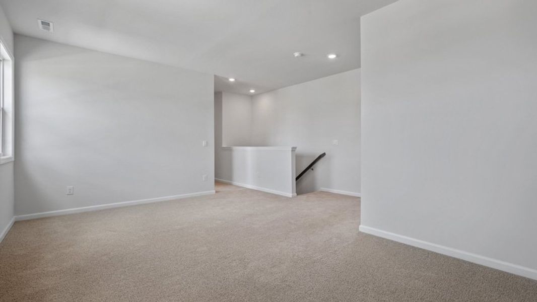 Representative unfurnished interior of a home built from the Lucas by D.R. Horton in The Manors at Haywood Glen, Knightdale (Image 28).