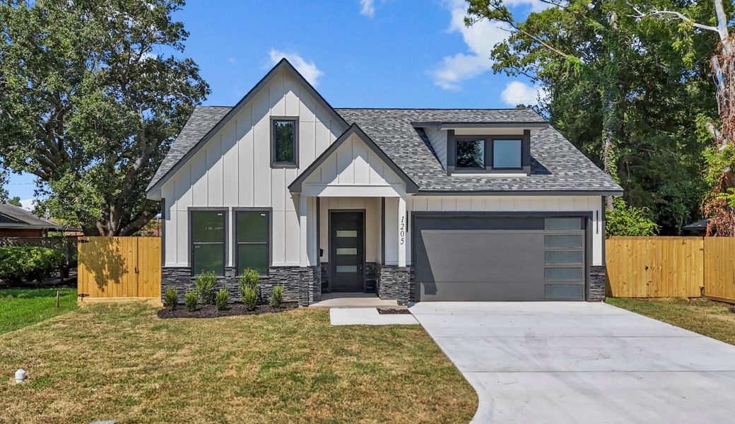 Front exterior of a new home in , Liberty, TX, highlighting curb appeal (Image 13). Front exterior of a new home in , Liberty, TX, highlighting curb appeal (Image 13).