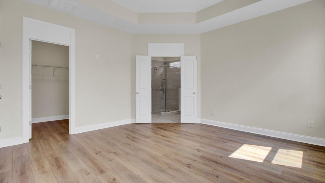 Spacious, unfurnished interior of a new home in Cresswind Charleston, Summerville (Image 31).