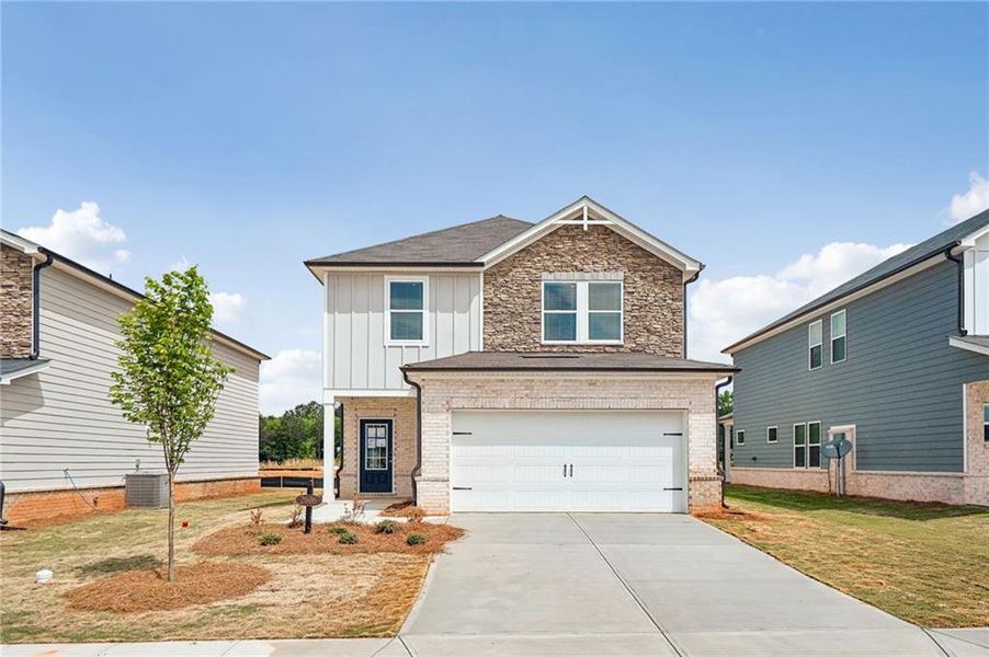 Front exterior of a new home in Martin Springs - Reserve Series, Lawrenceville, GA, highlighting curb appeal (Image 20).