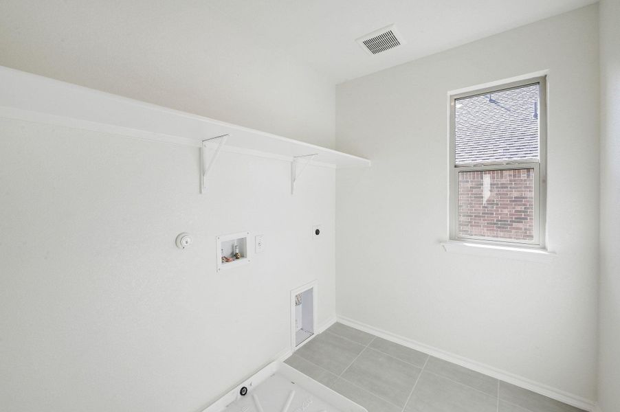 Spacious, unfurnished interior of a new home in Salerno - Classic Collection, Round Rock (Image 23). Spacious, unfurnished interior of a new home in Salerno - Classic Collection, Round Rock (Image 23).