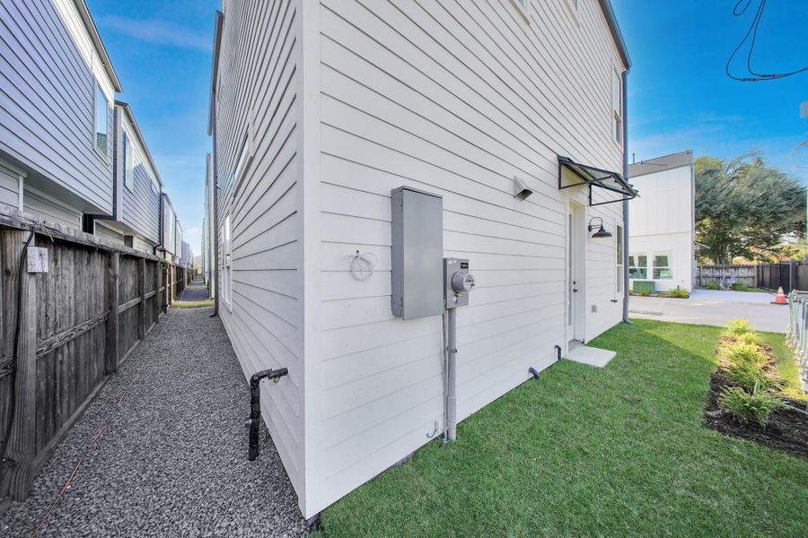 Exterior details and patio area of a home in , Houston (Image 3).