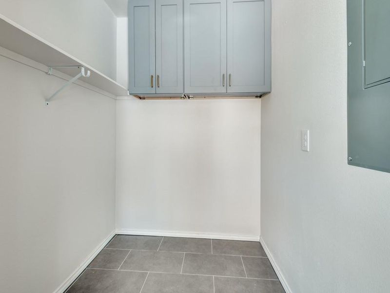 Spacious closet with tile patterned floors