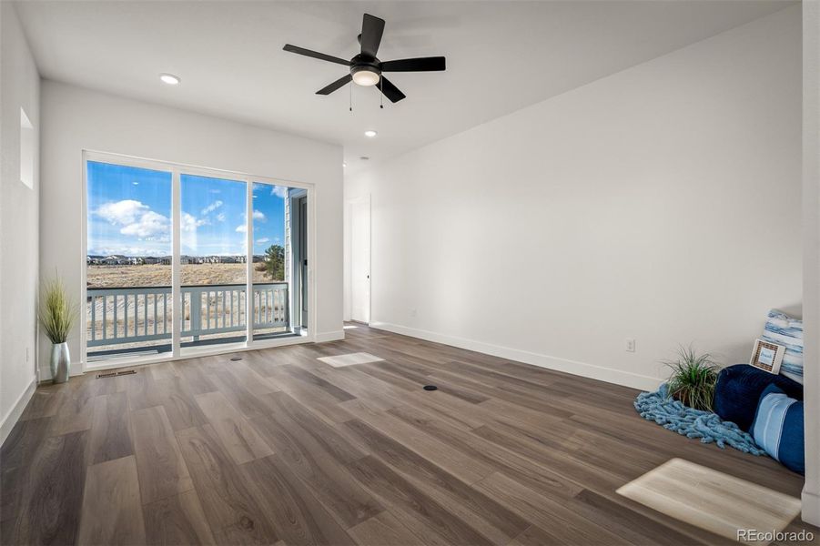 Spacious, unfurnished interior of a new home in Revel Crossing at Wolf Ranch - The Panorama Collection, Colorado Springs (Image 19).