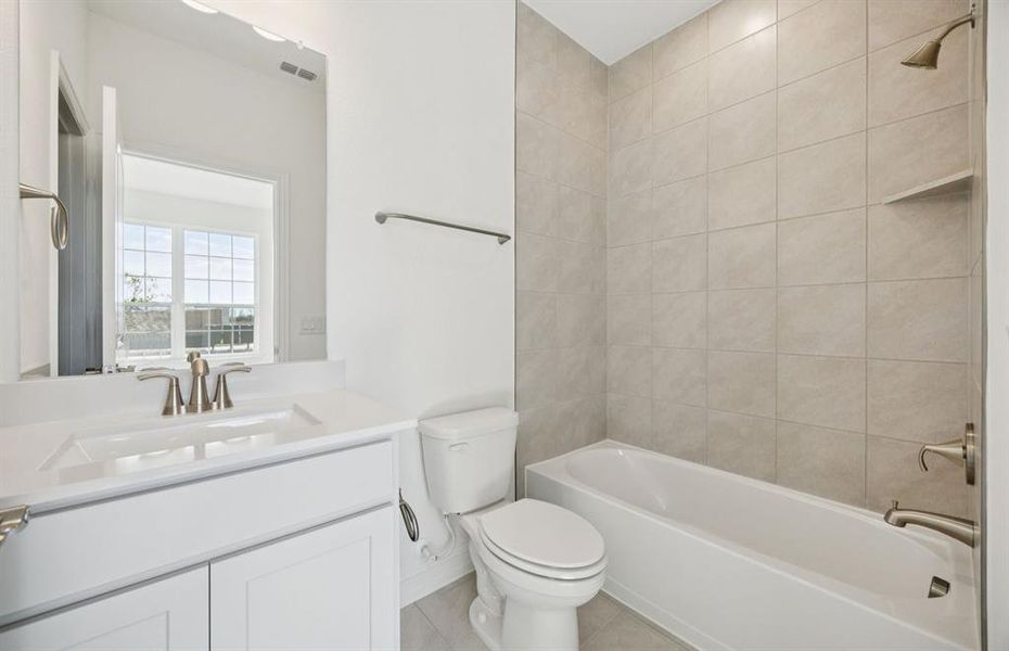Secondary bathroom with vanity