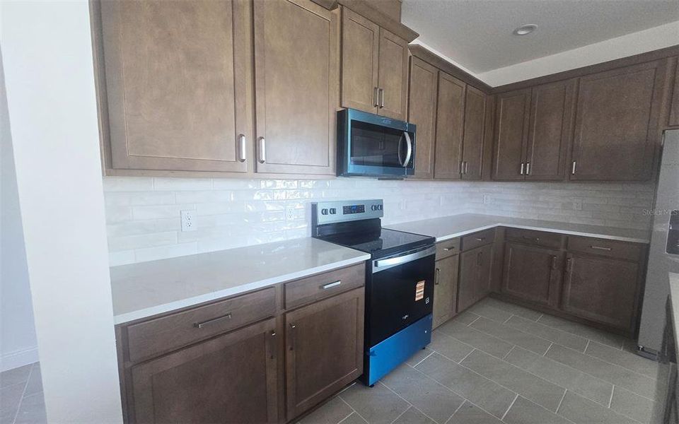 Furnished interior view inside a new home in Ridgeview, Clermont (Image 6). Furnished interior view inside a new home in Ridgeview, Clermont (Image 6).