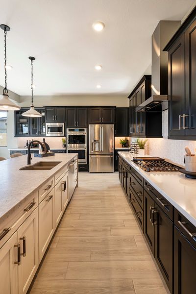Representative furnished interior of a home built from the Ventana Plan 4507 by Tri Pointe Homes in Waterston Central, Gilbert (Image 8).