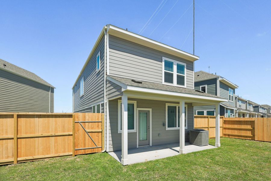 Exterior details and patio area of a home in Parkway Commons - City Series, Missouri City (Image 3).