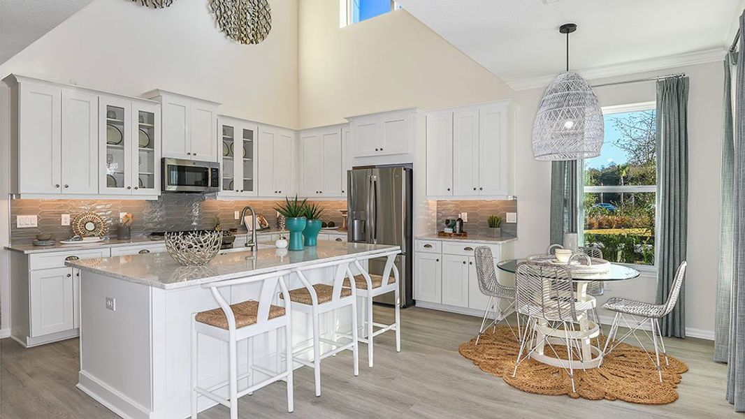 Representative furnished interior of a home built from the Newberry by Taylor Morrison in The Waters at Center Lake Ranch, St. Cloud (Image 6).