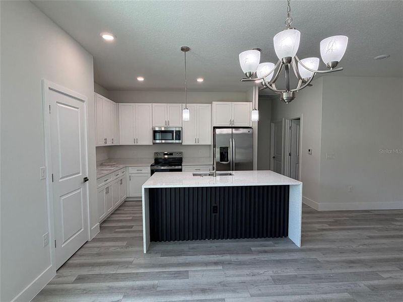 Furnished interior view inside a new home in , Dunnellon (Image 5).